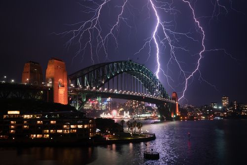 The Bureau of Meteorology issued a storm warning overnight as rain bucketed down over Sydney, causing chaos for drivers, commuters and travellers.