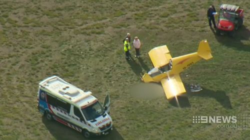 The pilot had died before rescuers were able to revive him. (9NEWS)