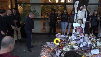 Liam Payne's father Geoff Payne greets mourning fans at memorial outside of Buenos Aires' Casa Sur hotel