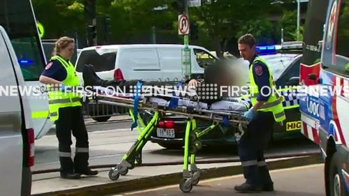 One police officer was taken to hospital. (9NEWS)