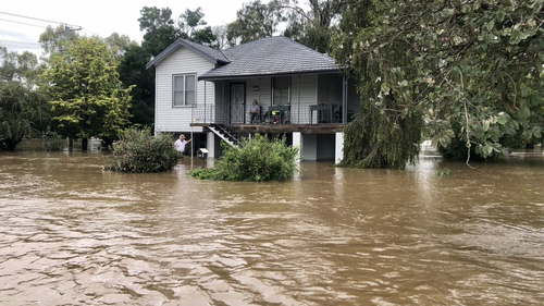 Home of Ernie and Sandra surrounded by floodwater in Scone. 
