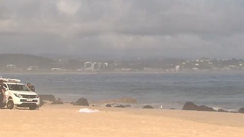 The man was surfing at Snapper Rocks, Coolangatta, when tragedy struck.