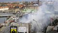 Firefighters work on the building after a fire broke out at the Stock Exchange in Copenhagen, Tuesday, April 16, 2024.  
