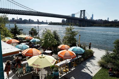 NEW YORK, NEW YORK - SEPTEMBER 04:  Tococina restaurant is seen on the promenade of the Williamsburg East River waterfront on September 04, 2021 in the Brooklyn borough of New York City. (Photo by John Lamparski/Getty Images)