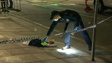 A police officer at the scene of a stabbing outside an Adelaide nightclub.