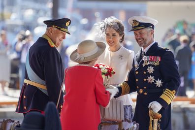 King Frederik, right, and Queen Mary of Denmark are welcomed by Norway's King Harald, left, and Queen Sonja, upon their arrival in Oslo Tuesday, May 14, 2024. 