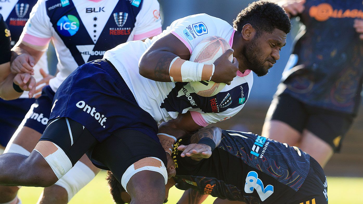  Isi Naisarani of the Rebels is tackled during the round four Super Rugby Trans-Tasman match between the Chiefs and the Melbourne Rebels at Leichhardt Oval on June 06, 2021 in Sydney, Australia. (Photo by Mark Evans/Getty Images)