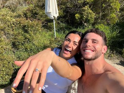 Millie Boyle shows off her engagement ring after Adam Elliott proposed.