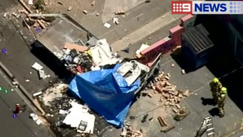 The area around the crash site is littered with debris. (9NEWS)