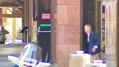 The first hostage exits the cafe at Martin Place.