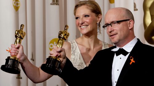Eva Orner with Alex Gibney, fresh after their 2008 Oscar win. (AAP)