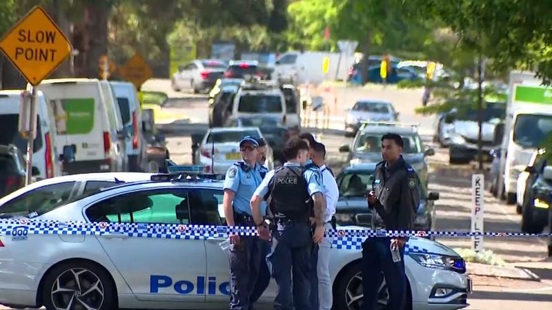 Police shoot two men after allegedly stolen car drove at them | Nine.com.au
