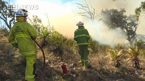 Fire crews in Rockhampton are monitoring a bushfire at Mount Archer that could threaten homes.