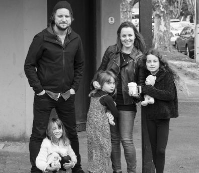 Daniel Lewis with his partner and three daughters