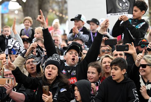 Wet weather is doing little to dampen the spirits of Eagles and Pies fans today.