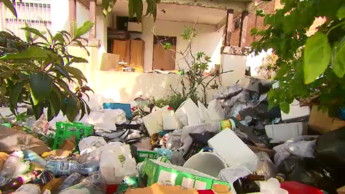 The Bondi house has knee-high rubbish in every square inch of the property.