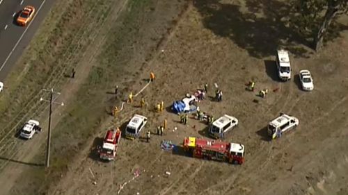 Two people have died and two children have been taken to hospital after a single-vehicle crash north of Melbourne. (9NEWS)