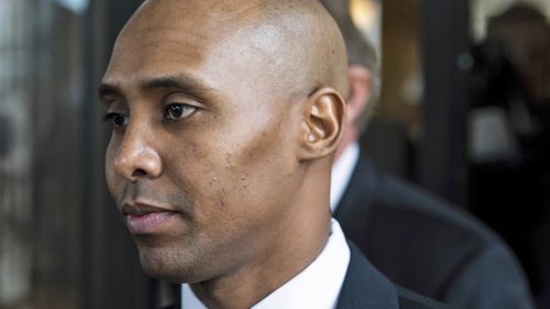 Former Minneapolis police officer Mohamed Noor leaves the Hennepin County Government Center after the first day of trial in Minneapolis on Monday, April 1, 2019.