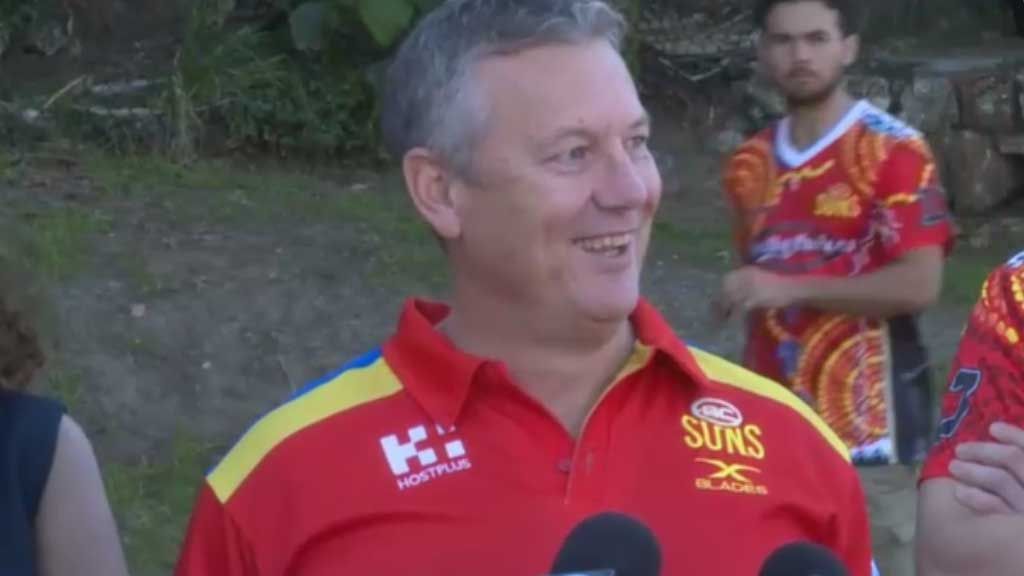 Gold Coast boss hits out, literally, at a reporter