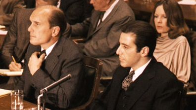 Robert Duvall as Tom Hagen and Al Pacino as Don Michael Corleone.  