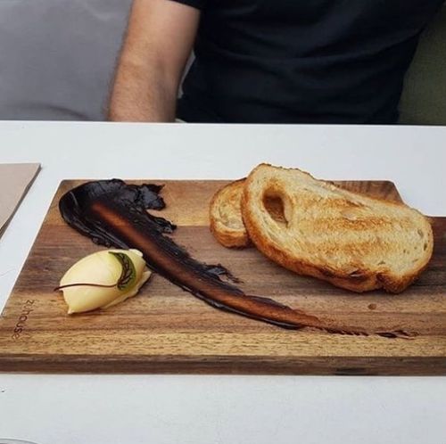 This photo of a Newcastle cafe's Vegemite toast has sparked a wave of online fury. (Instagram/@huonoliver)