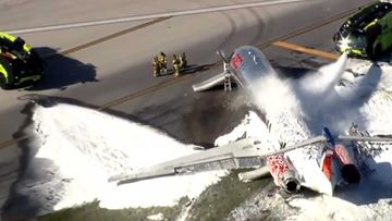The plane caught fire after a landing gear malfunction.