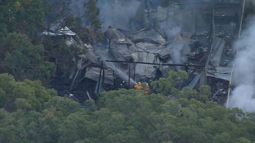 Dozens of detectives are on Russell Island south-east of Brisbaneun covering what caused the fire that killed a dad and five boys.Police have confirmed that "some elements" of the house fire that killed the children and their 34-year-old father require "closer scrutiny".