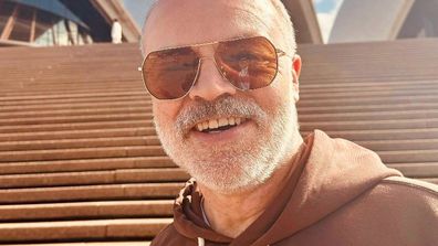 Graham Norton on the Sydney Opera House steps