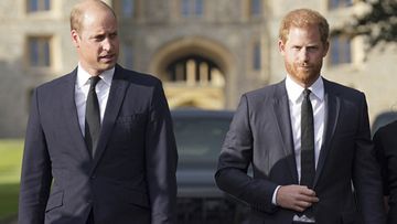 Prince William, Prince of Wales, left and Prince Harry walk to meet members of the public at Windsor Castle, following the death of Queen Elizabeth II on Thursday, in Windsor, England, Saturday, Sept. 10, 2022.