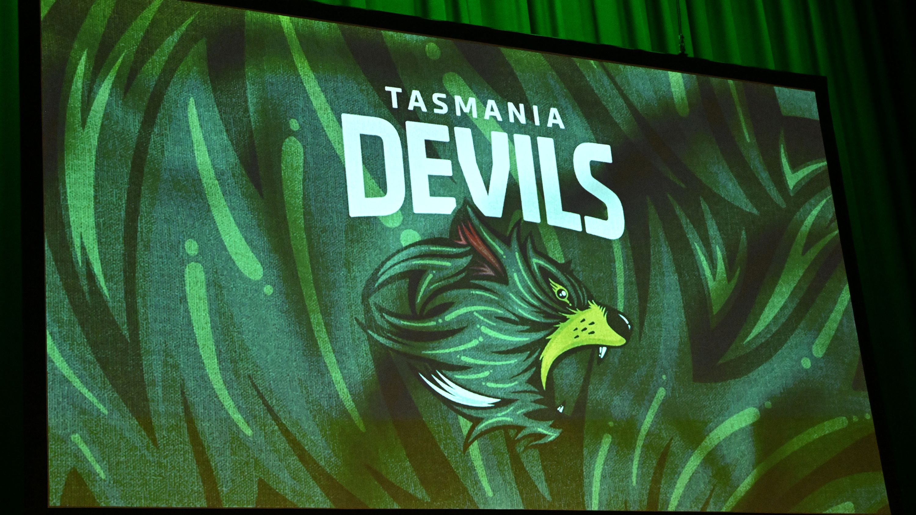 The Tasmania Devils logo is unveiled during an AFL event.