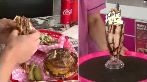 The super-eater made light work of the burger and a Reese's Pieces shake. (9NEWS)