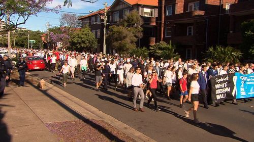 Thousands of walkers took to the streets of Coogee this morning for the White Ribbon march to raise further awareness about domestic violence. 