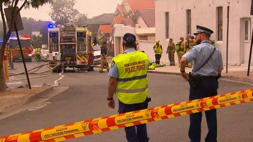 Emergency services responding to a building fire in Sydney's inner west.