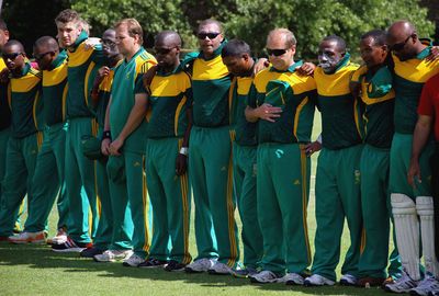 Blind world cup players observe a minute's silence.