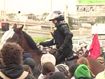 Low-level acid thrown at police officers, horses punched