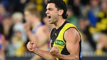 MELBOURNE, AUSTRALIA - APRIL 08: Tim Taranto of the Tigers celebrates kicking a goal during the round four AFL match between Richmond Tigers and Western Bulldogs at Melbourne Cricket Ground, on April 08, 2023, in Melbourne, Australia. (Photo by Quinn Rooney/Getty Images)