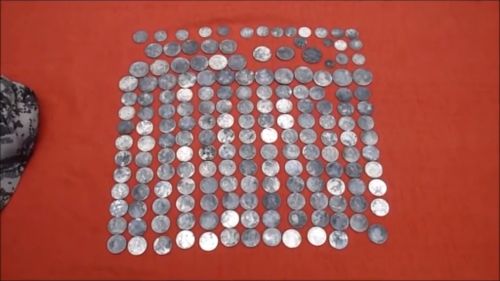 Silver antique coins. (YouTube/Aquachigger)