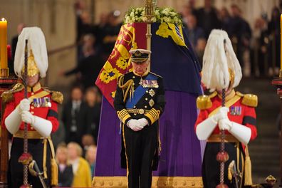King Charles III stands vigil beside the coffin of his mother, Queen Elizabeth II, as it lies in state on the catafalque in Westminster Hall, at the Palace of Westminster, on September 16, 2022 in London England.