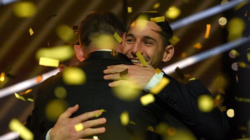 Smith is congratulated by team mate Billy Slater. (AAP)