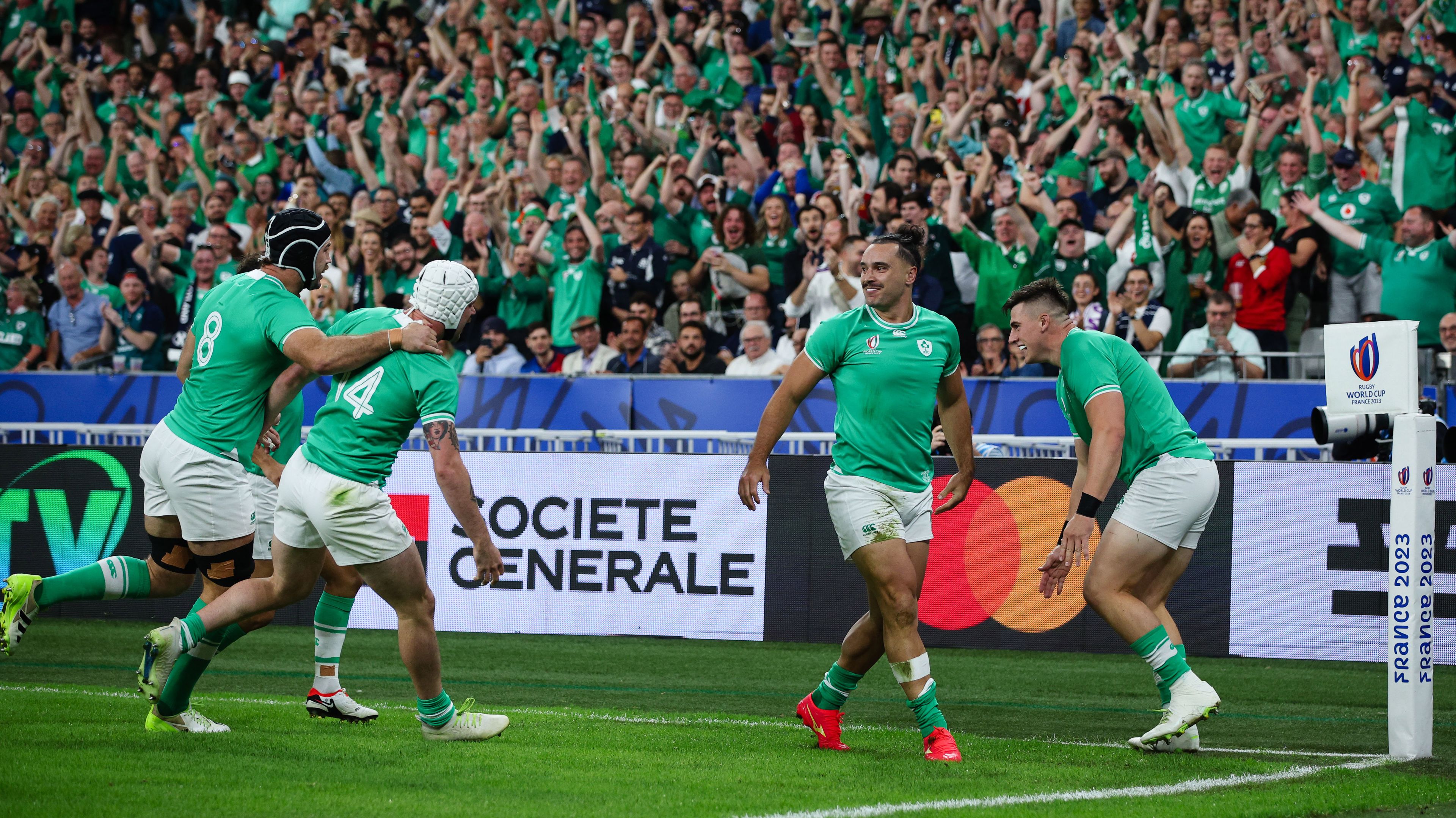 PARIS, FRANCE - OCTOBER 7:  James Lowe of Ireland celebrates scoring his sides first try with team mates during the Rugby World Cup France 2023 match between Ireland and Scotland at Stade de France on October 7, 2023 in Paris, France. (Photo by Craig Mercer/MB Media/Getty Images)