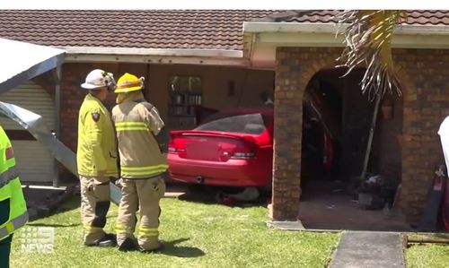 A Gold Coast family is counting their lucky stars after narrowly avoiding being hit by a car that came crashing into their lounge room.