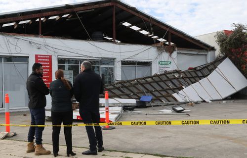 The roof of a tyre business in Cranbourne, Victoria collapsed Friday amid wild winds. 