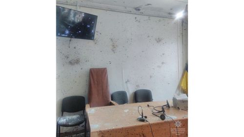 The courtroom can be seen covered in shrapnel. (Image: Ukrainian Police Facebook)