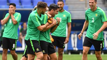 A relaxed Socceroos camp ahead of tonight's do-or-die clash. (AAP)