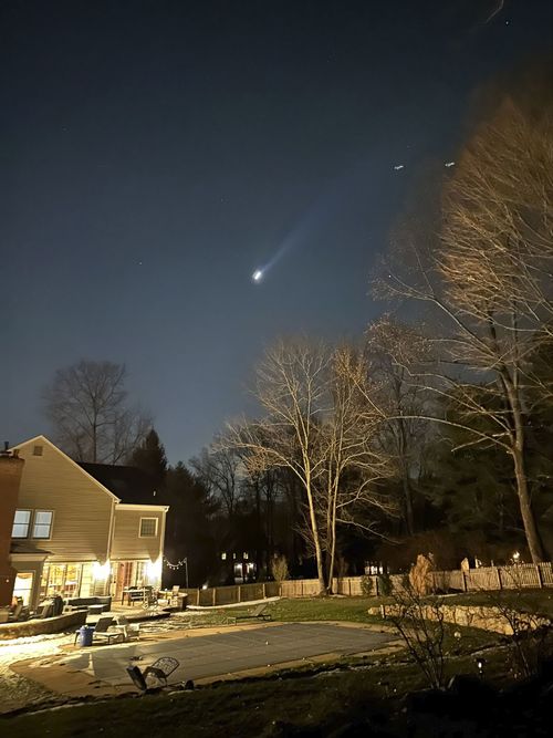 This photo provided by Brian Glenn shows what appears to be multiple drones flying over Bernardsville, New Jersey, on Dec. 5.