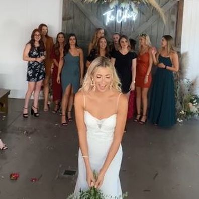 Wedding guest viciously rips the bouquet from another woman's hand