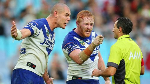 Bulldogs forward David Klemmer and captain James Graham display their anger towards referee Gerard Sutton. (Getty)
