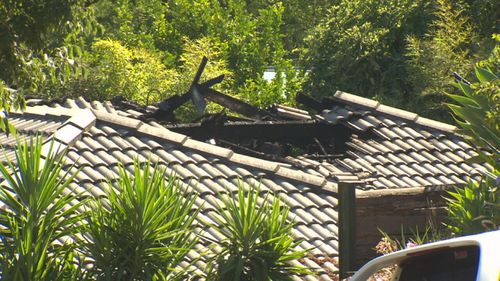 The fire caused the home's roof to collapse.
