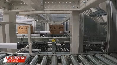 At Coles' brand new facility in Brisbane high-tech and high-speed warehouse workers are replaced by robotics and computer systems.