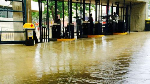Flooding creeps up to the turnstiles at The Gabba in Brisbane. (Twitter @ARamseyCricket)